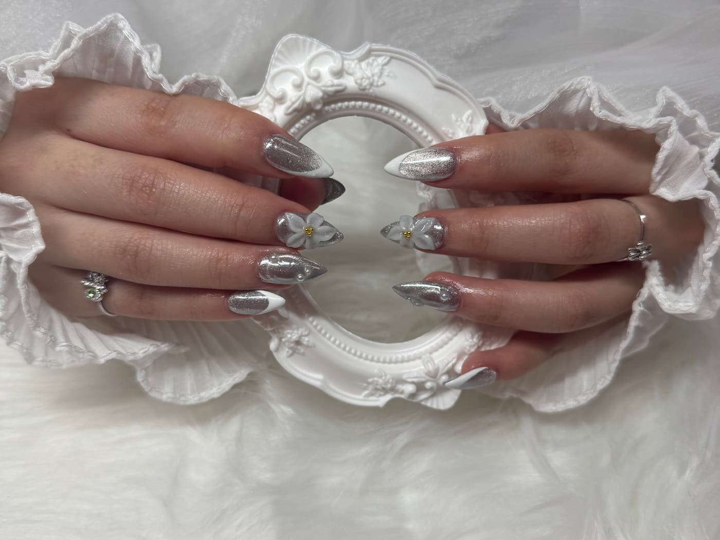 Silver chrome manicure done at Great Nails in Coon Rapids