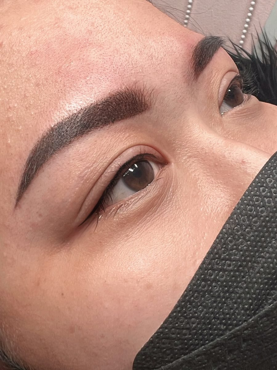 Permanent eyeliner and brows on a client wearing a mask