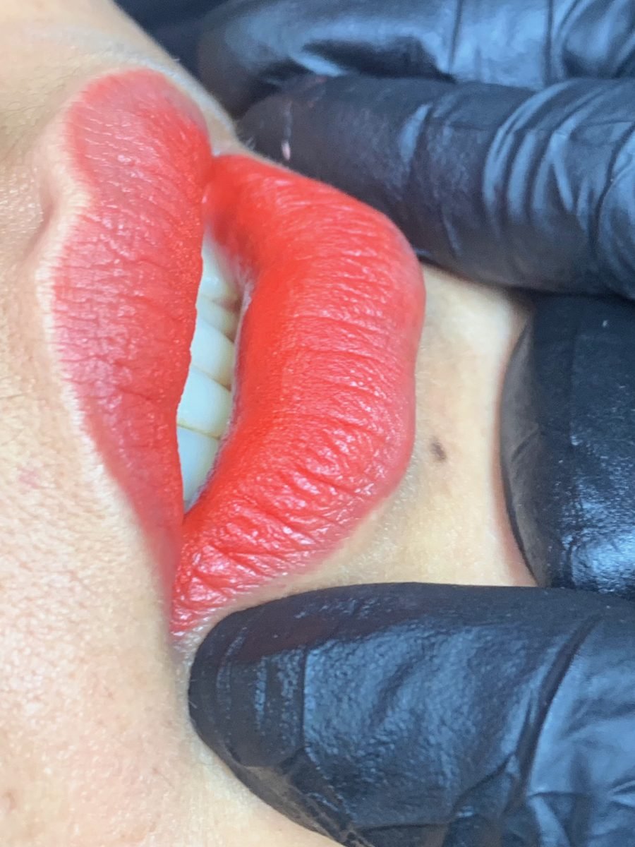 Close-up of lip blush on a client
