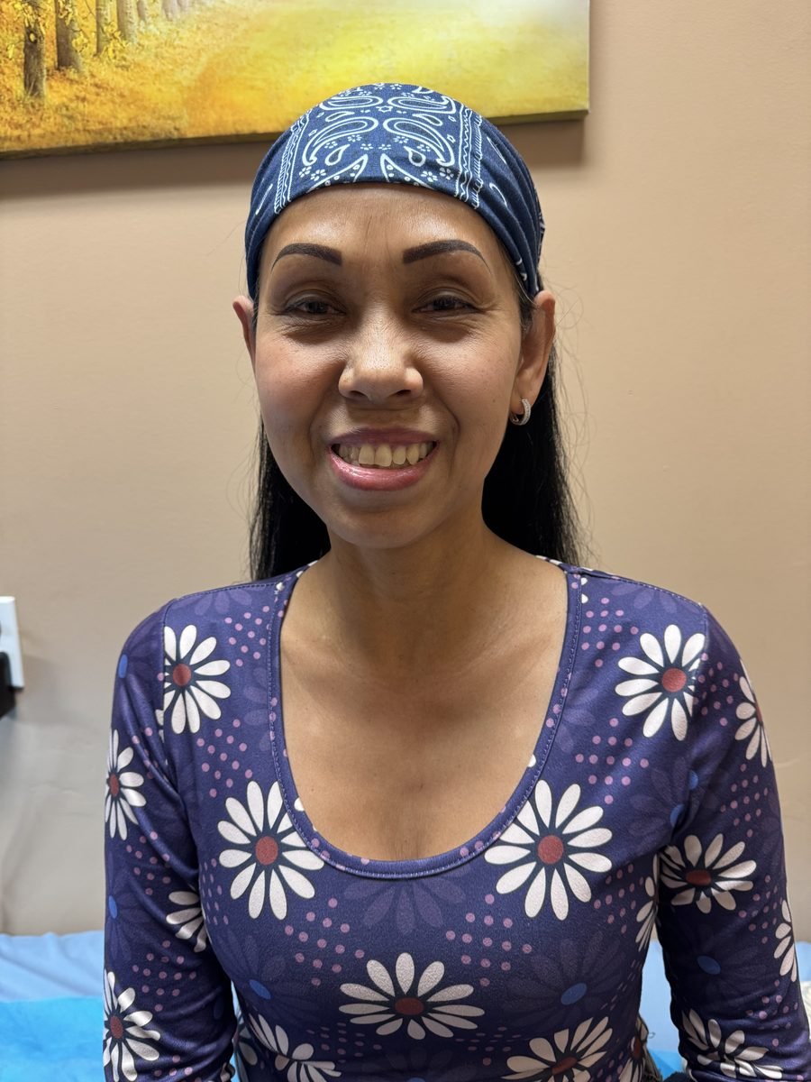 Powder brows on a smiling client